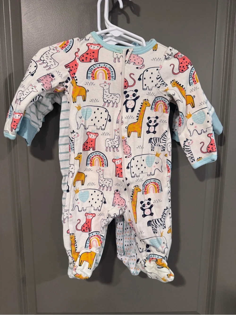 Three piece lot of light weight footed Pajamas, gender neutral.